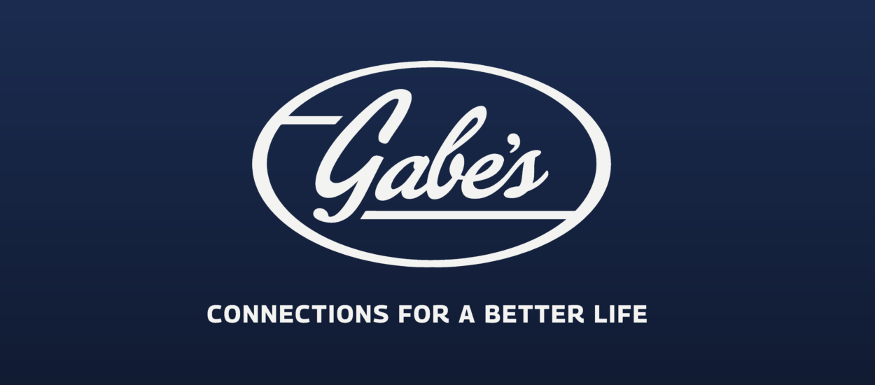 Gabes script logo in white oval, blue background, uppercase tagline.